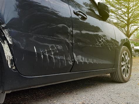 How Much Does It Cost to Repair a Car Dent? And Why Do Birds Suddenly Appear Every Time You Park Under a Tree?